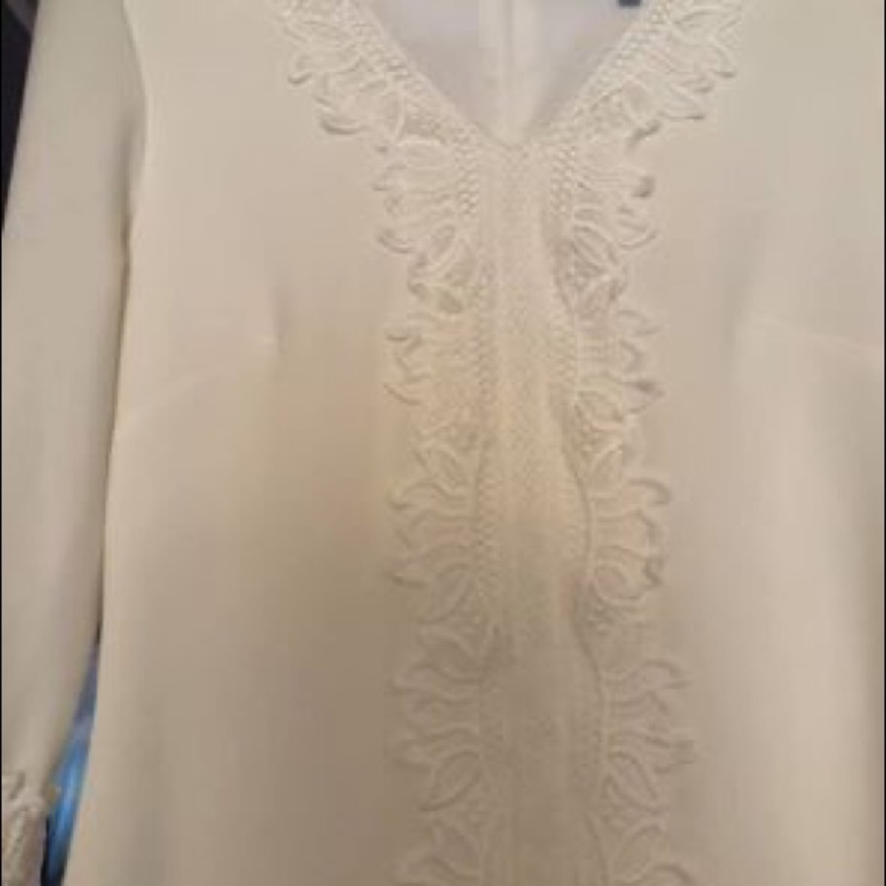 White Dress with Bell Sleeves and Crochet Detail